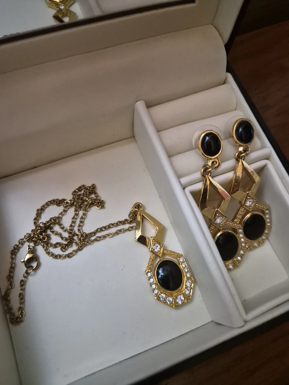 Avon gold tone